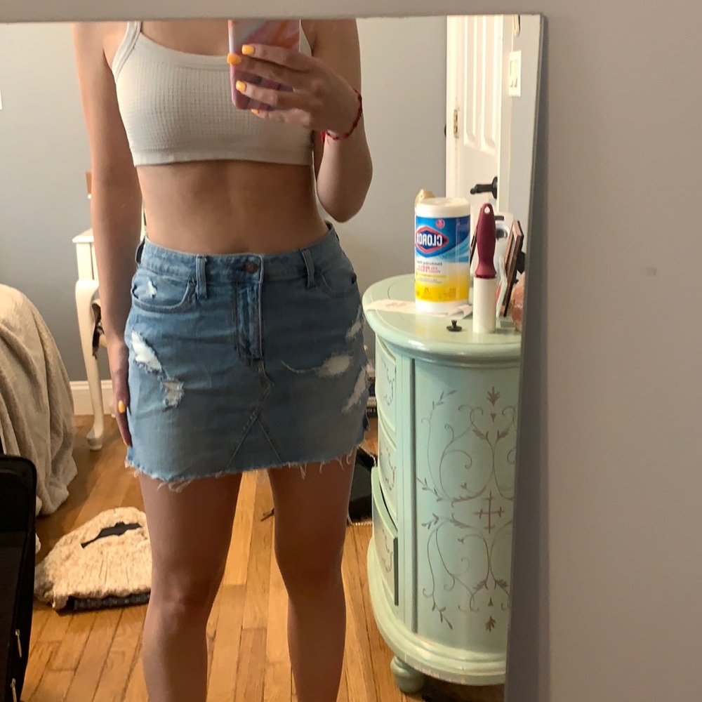 Ripped denim mini skirt